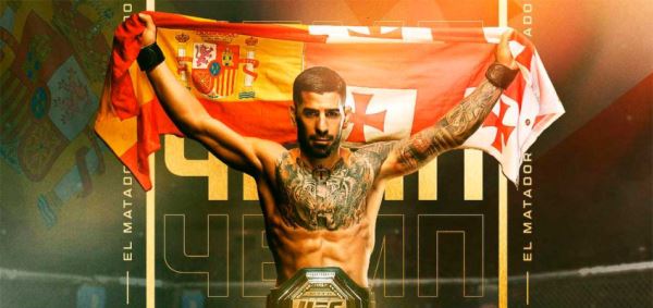 Илия Топурия завоевал пояс чемпиона UFC в легком весе